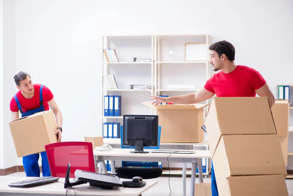 Carefully packing a computer with protective materials to prevent damage.